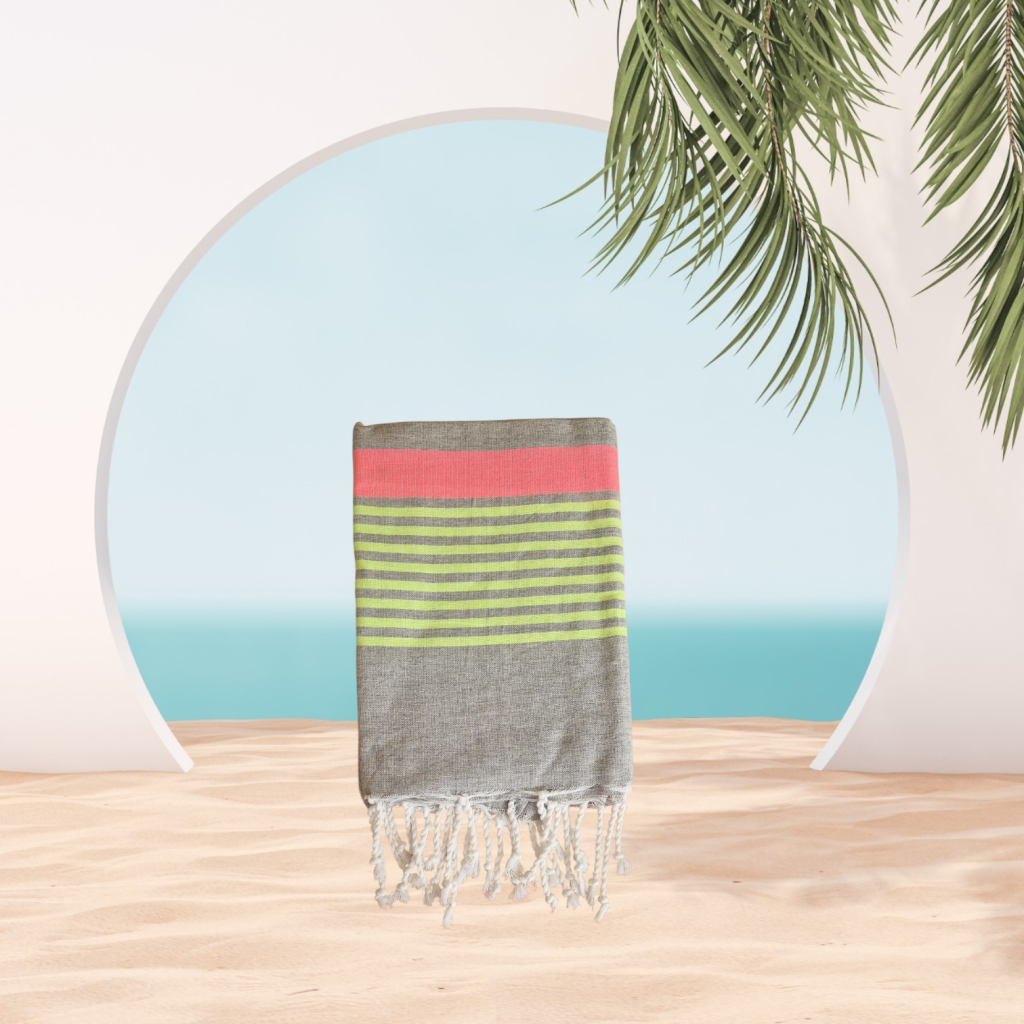 Fouta PUNCH aux rayures tropicales – Le combo parfait entre style, fraîcheur et légèreté.